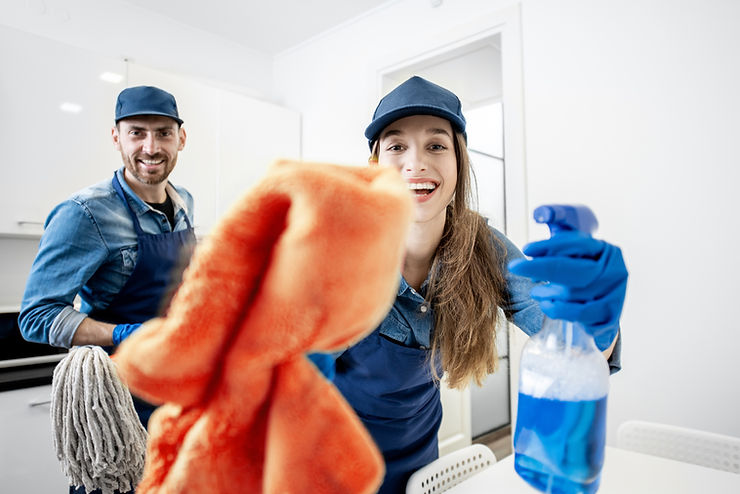 Two people cleaning.